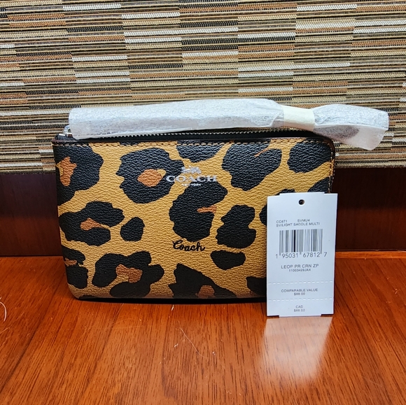 Coach Handbags - NWT Coach Leopard Print Zip Wristlet